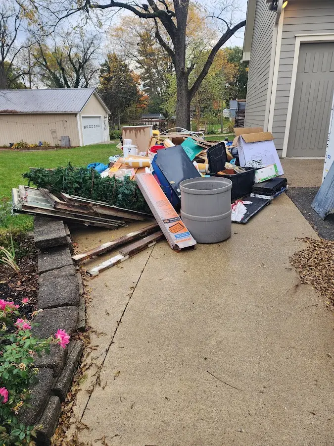 Dumpster being loaded with debris for 3 Yard Dumpster Rental in Esopus